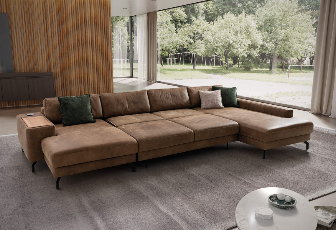 Couch in U-Form mit Bettfunktion | © sedda Polstermöbel